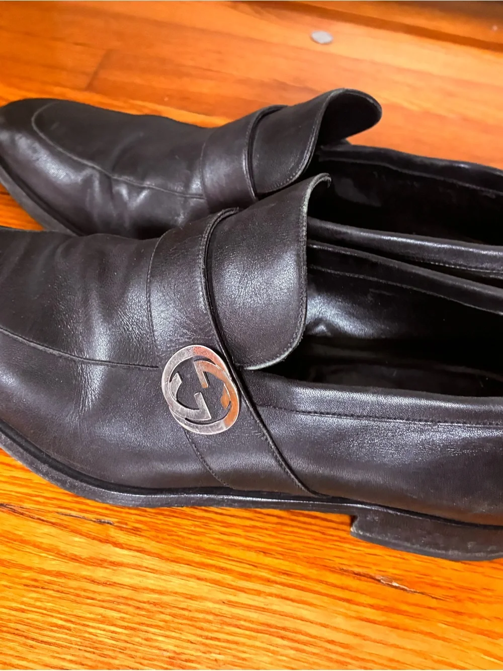 Gucci Black Leather Men's Slip-On Loafers with Silver Logo